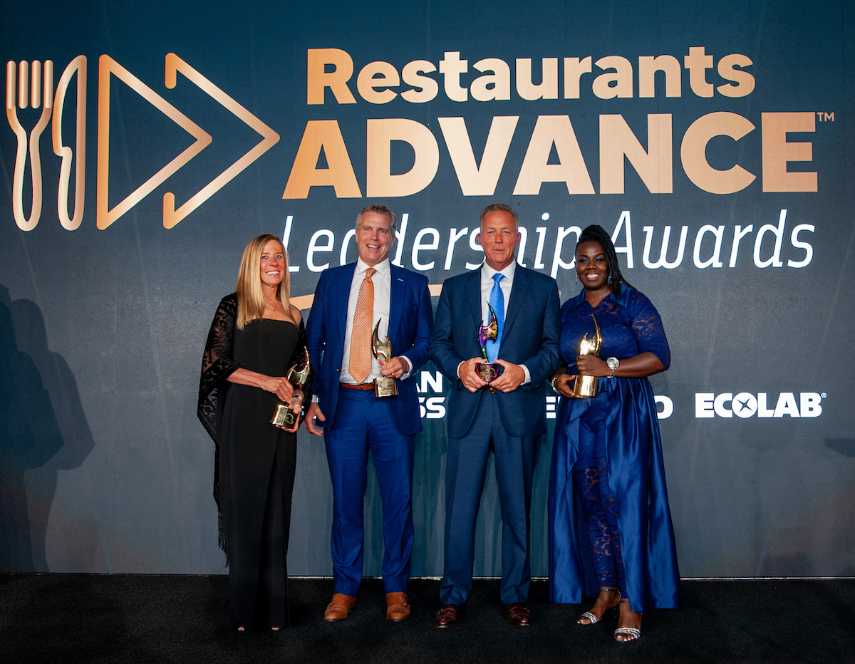 Photo of the 2023 Restaurants Advance Leadership Awards: Sue Petersen, Carl Sobocinski, Michael Hickey, and Lakisha Hunter.